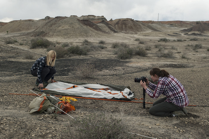 Director Lexi Jamieson Marsh filming Dr. Lisa Boucher as she sets up camp in the Bisti/De-Na-Zin Wilderness Area. © 2015 Kelsey Vance